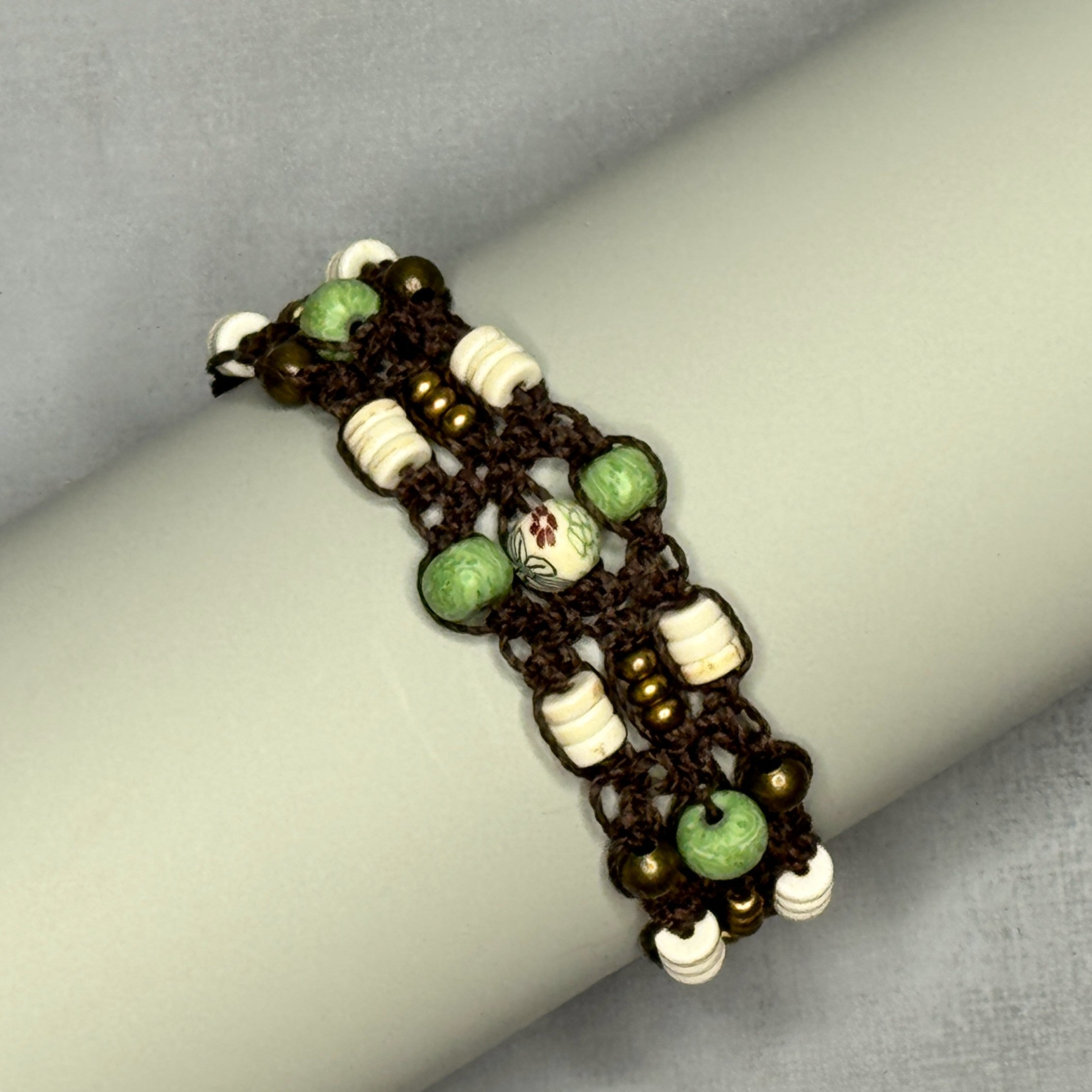 Brown Macrame Bracelet with green, white and brass beads