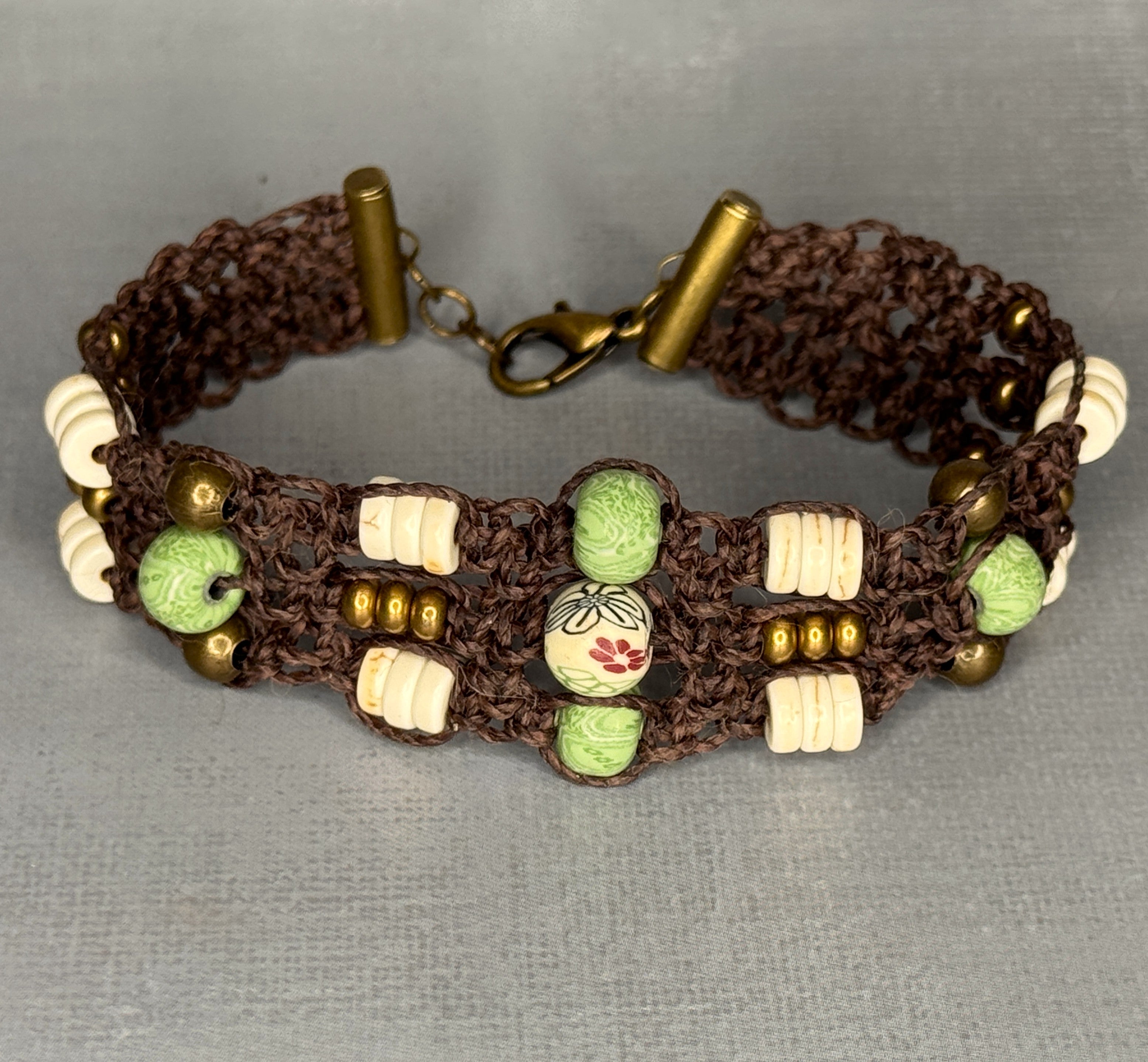 Brown Macrame Bracelet with green, white and brass beads