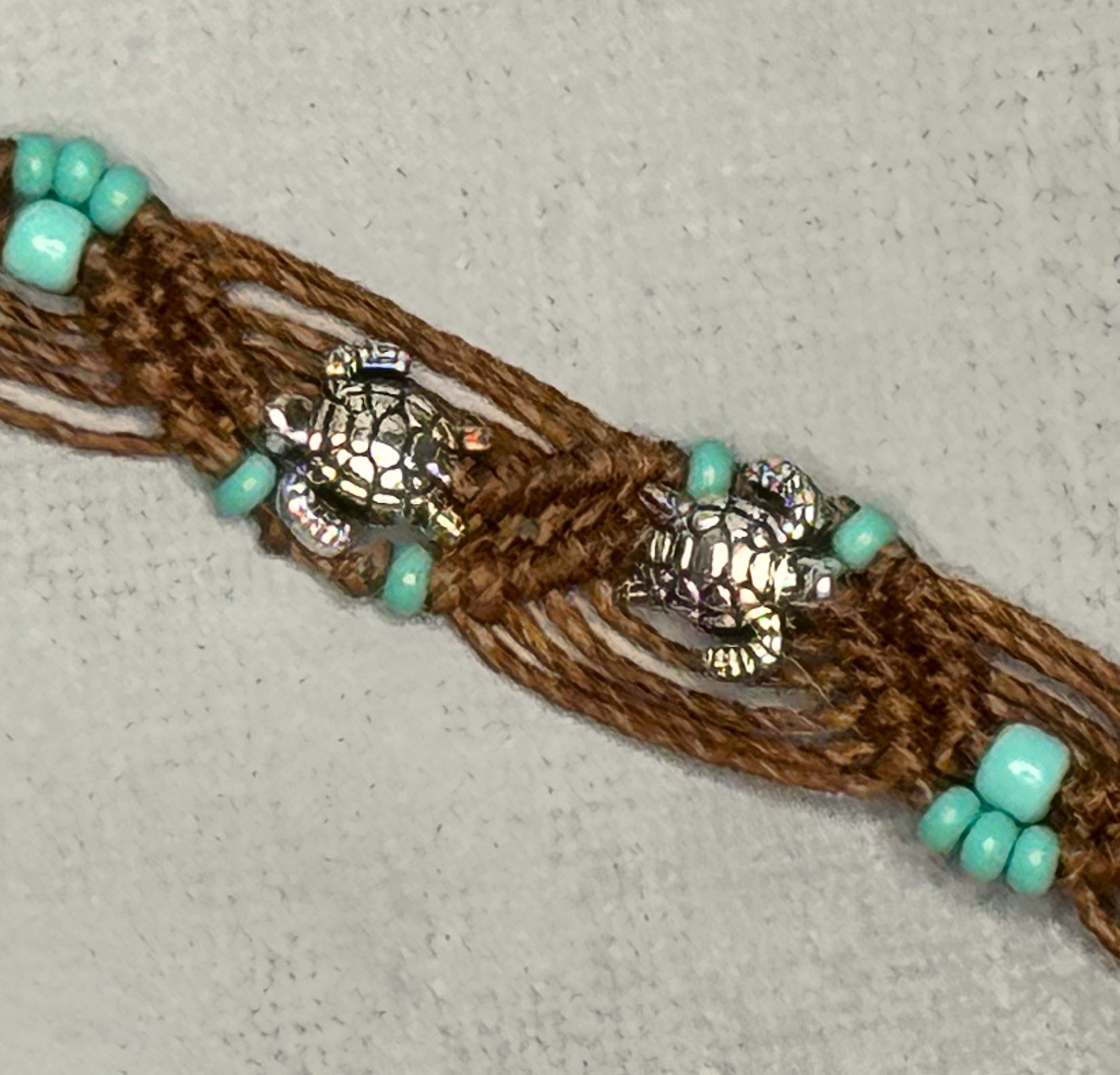 Brown Macrame Bracelet with Turquoise colored beads and Sea Turtle charms