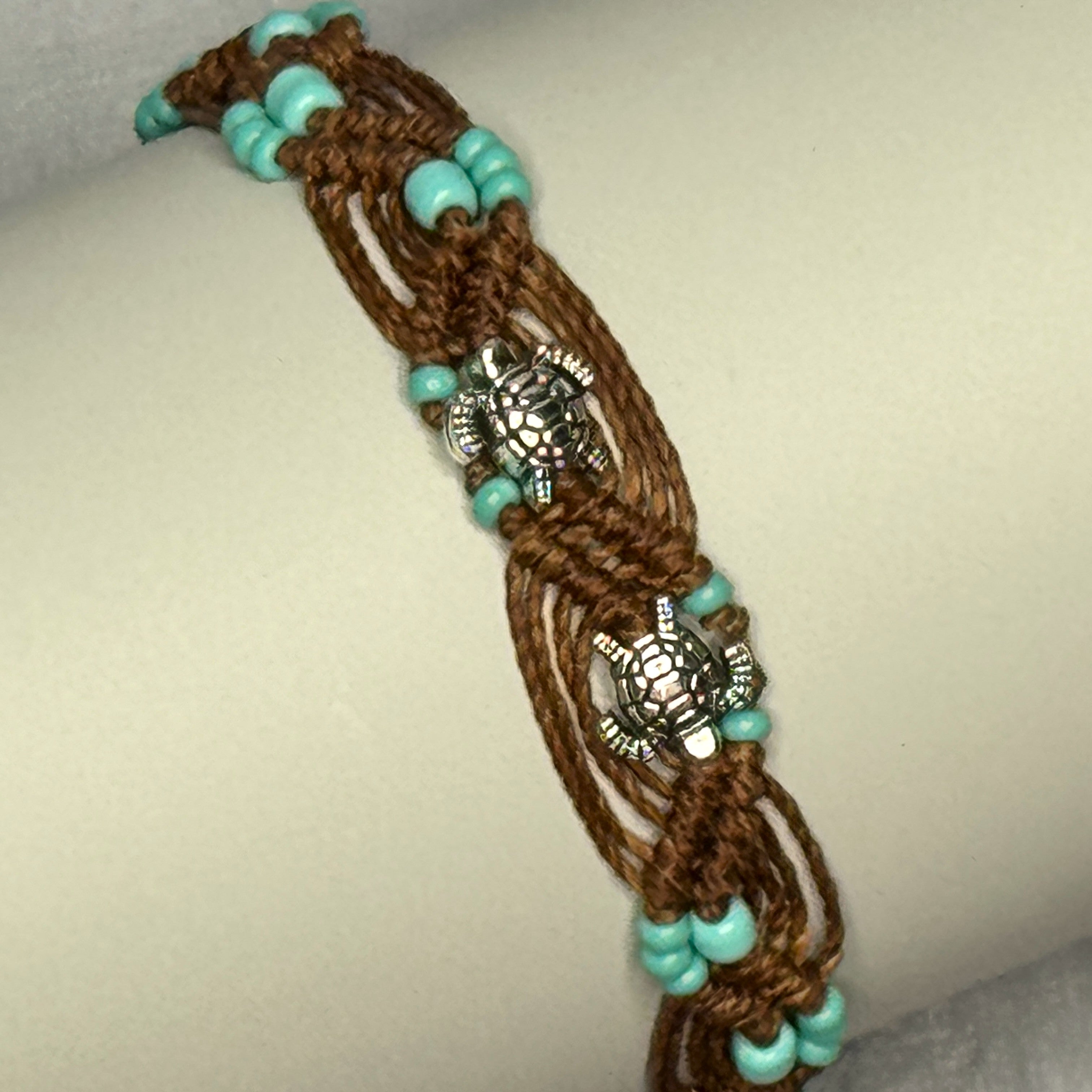 Brown Macrame Bracelet with Turquoise colored beads and Sea Turtle charms